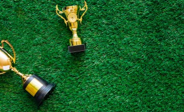 Dos copas de fútbol / FREEPIK